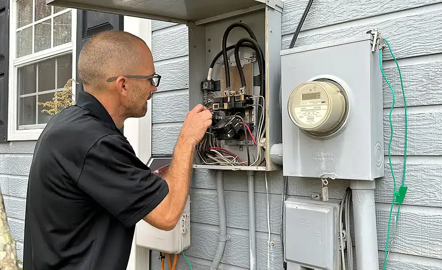Xcalibur Services electrician conducting maintenance