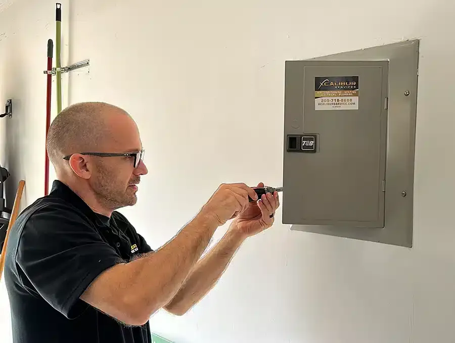 Xcalibur Services electrician doing maintenance