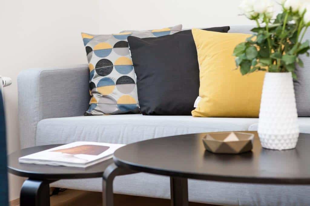 ashtray, book, and cushion decoration