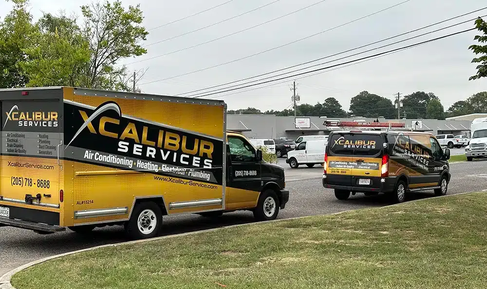 Xcalibur Services work vehicles spread apart in Alabaster, AL