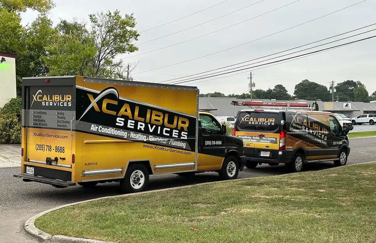 Xcalibur Services work vehicles outside