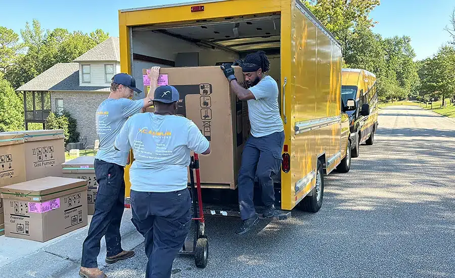 Xcalibur Services employees unloading work truck in Birmingham, AL
