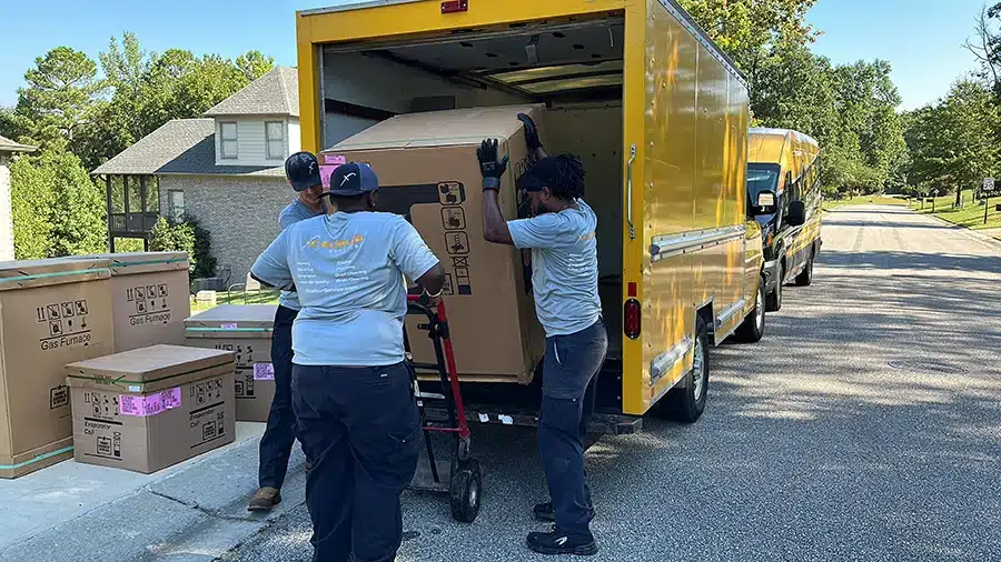 Xcalibur Services employees unloading work truck in Birmingham, AL